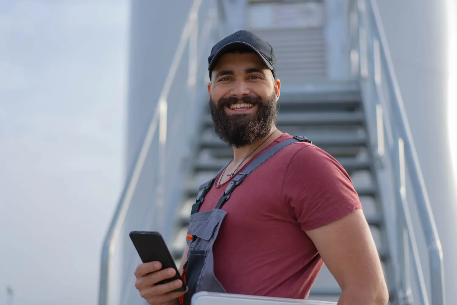 Celero Cloud GmbH- happy man with a phone in hand